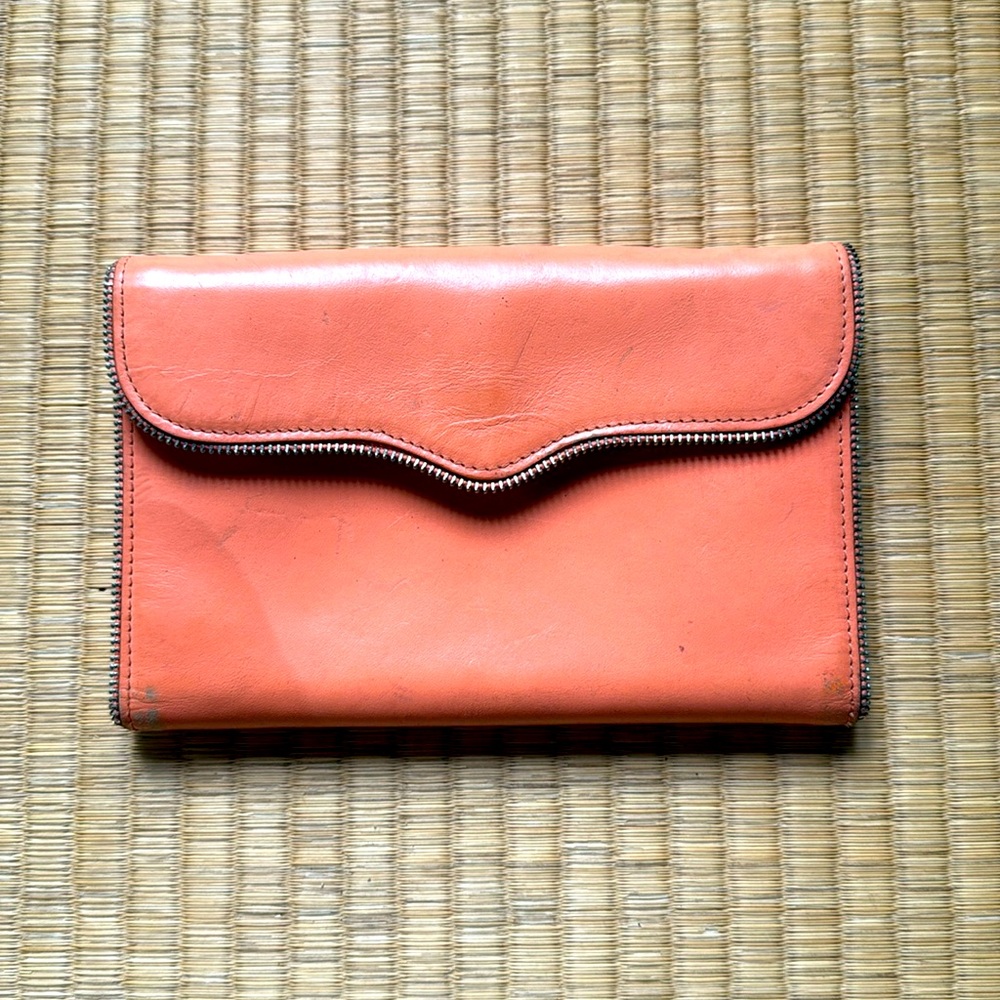 Rebecca Minkoff wallet.  Zipper teeth detail. Peach color. Good used condition